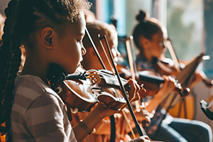 young children playing the violin