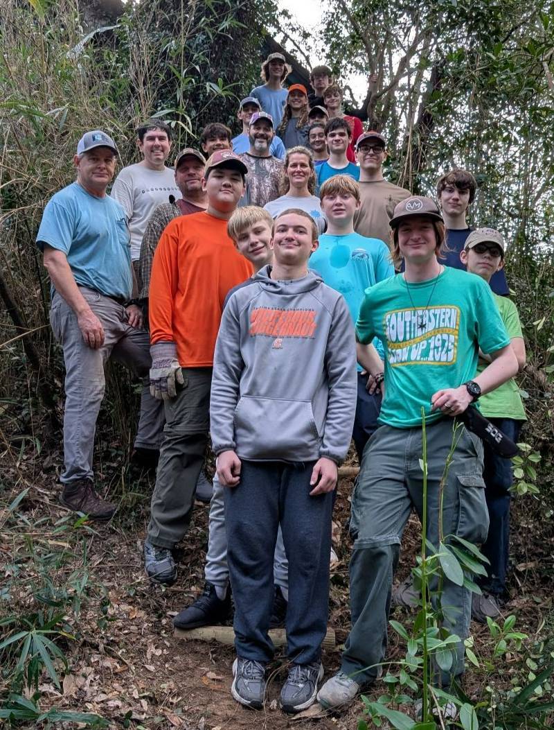 group of scouts after clearing ravine path