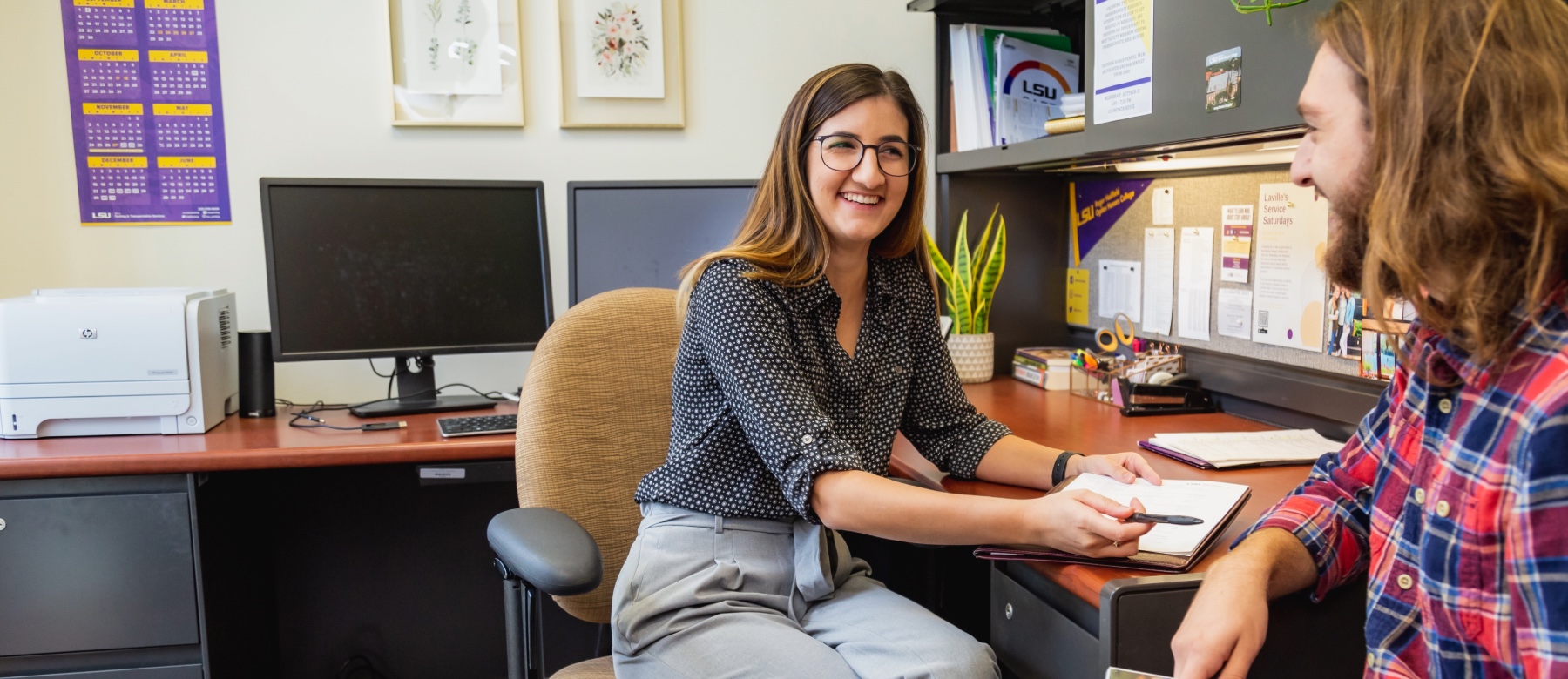 Photo of an Ogden Honors College advisor in an appointment.