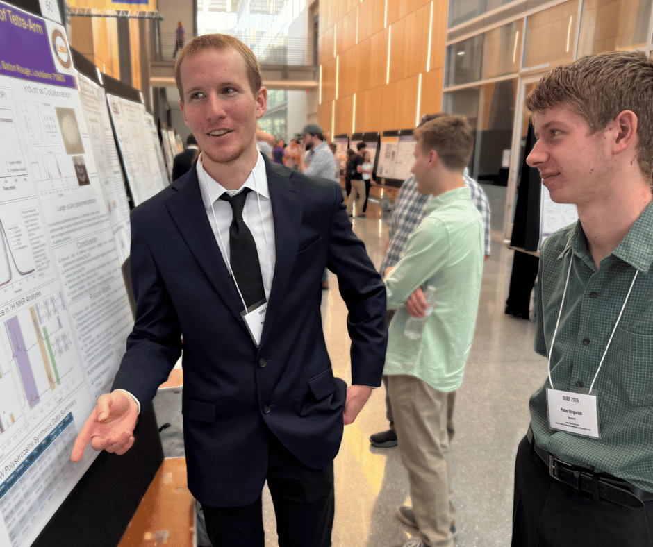 Ryan presenting his poster