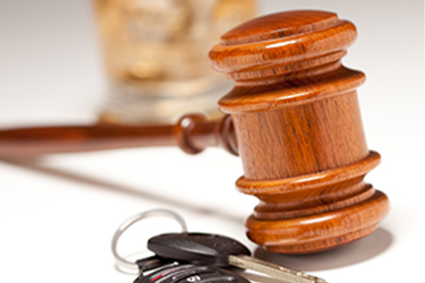 Judge's gavel beside car keys representing DWI court evaluation