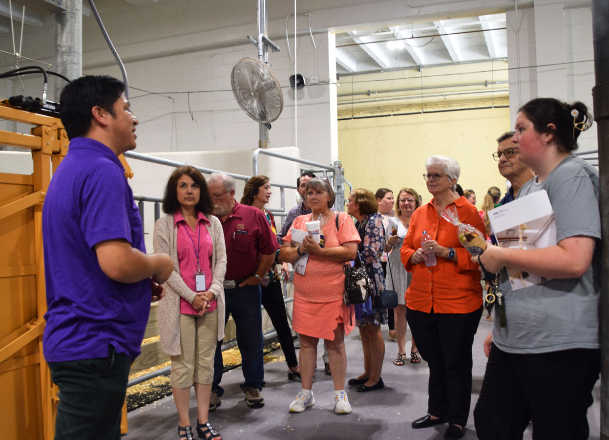 Dr. David Martinez shows visitors the space